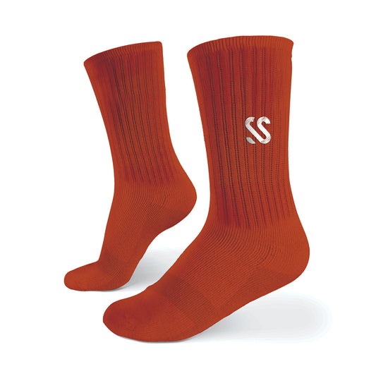 A pair of dark orange combed cotton socks
